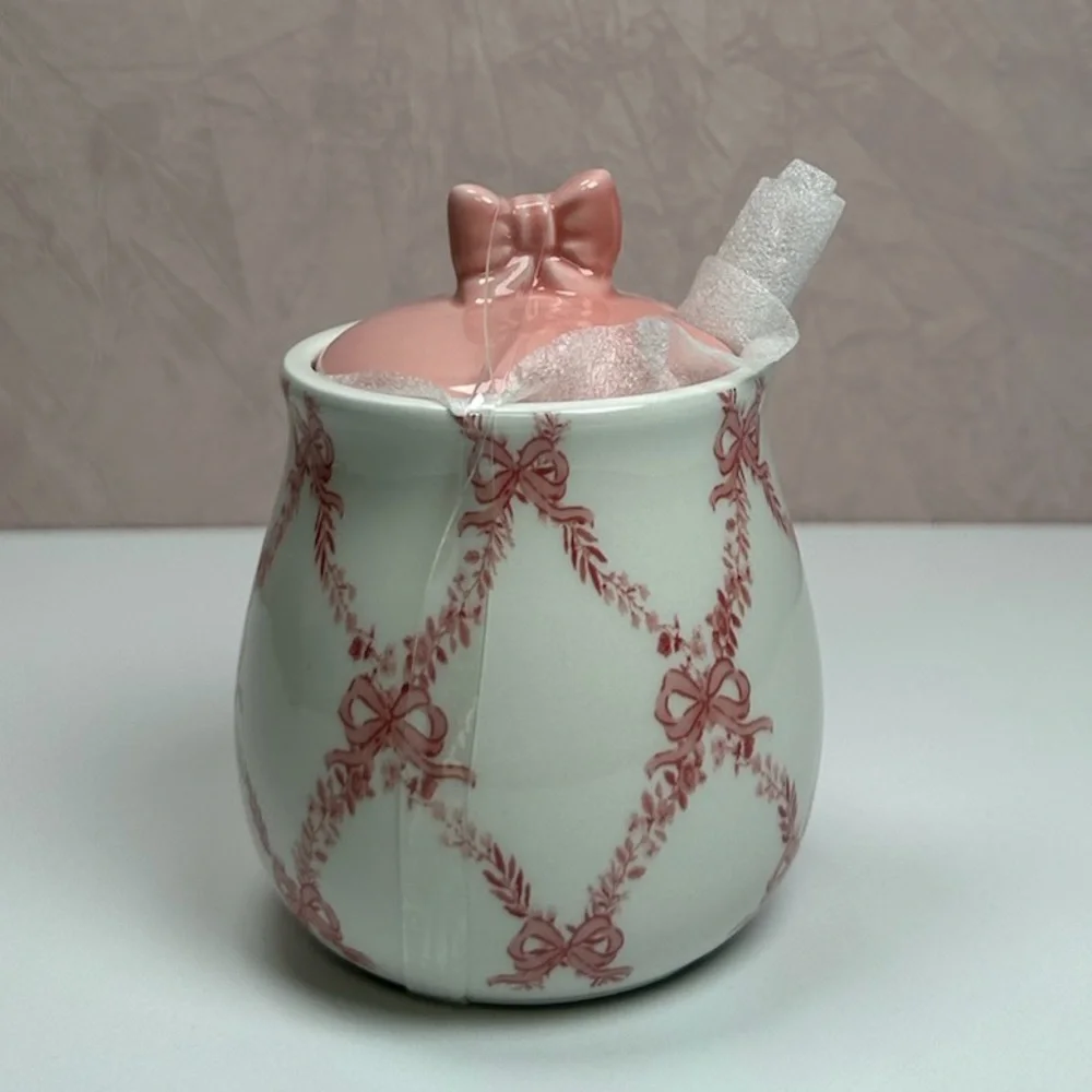 Elegant Pink and White Ceramic Sugar Bowl with Bow Accents